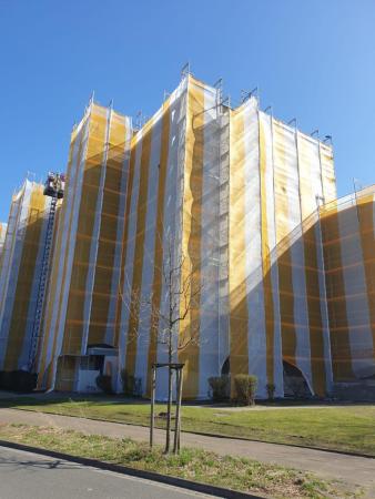 Preview: 3,07 x 100 m, Gerüstschutznetz Typ-Secura, Farbe: herbstgelb / weiß